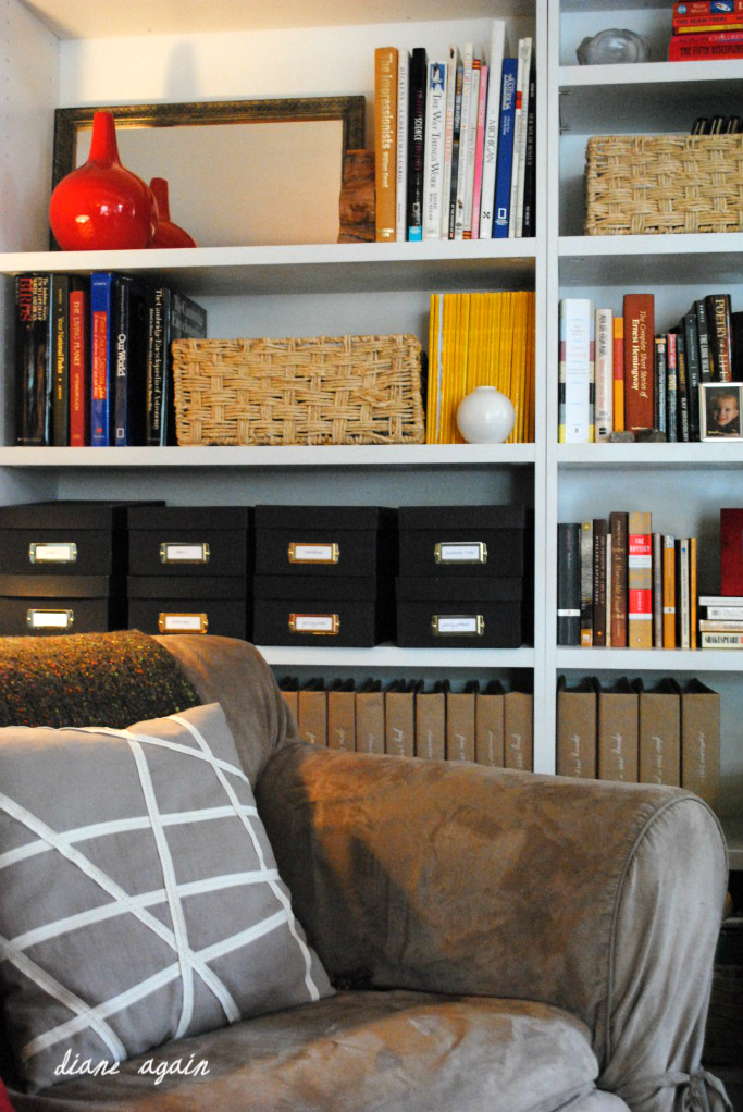 Family Room Bookshelf Mirror Basket Red Vase White Vase National